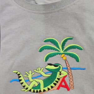 100% Cotton Embroidered Unisex T-Shirt – Miami, Florida / Iguana Relaxing On The Beach In Miami, FL